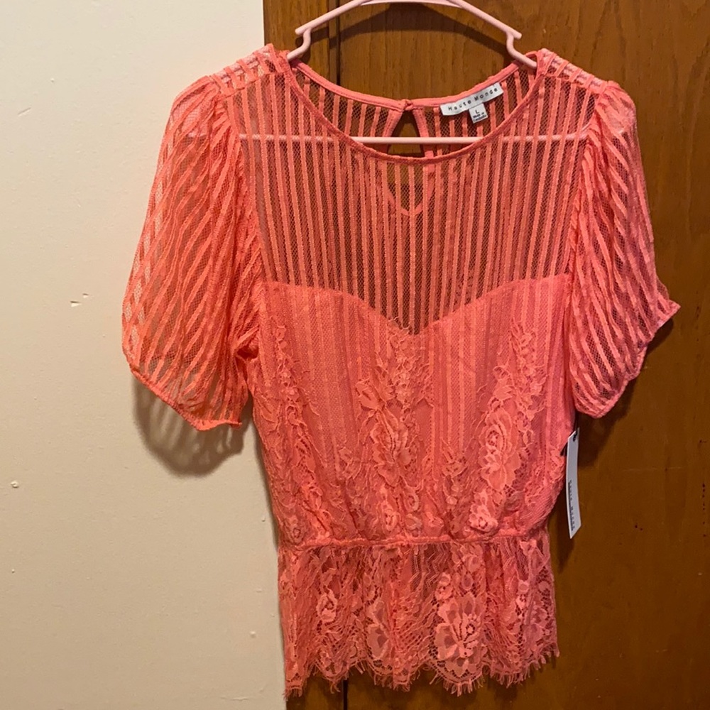 Color between red, pink or more like a peach color